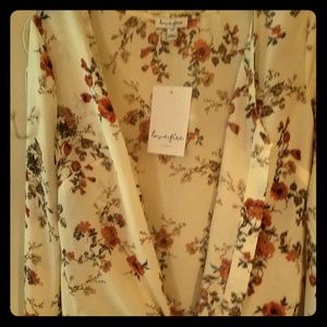 Brand new flowy sleeves ties in front blouse